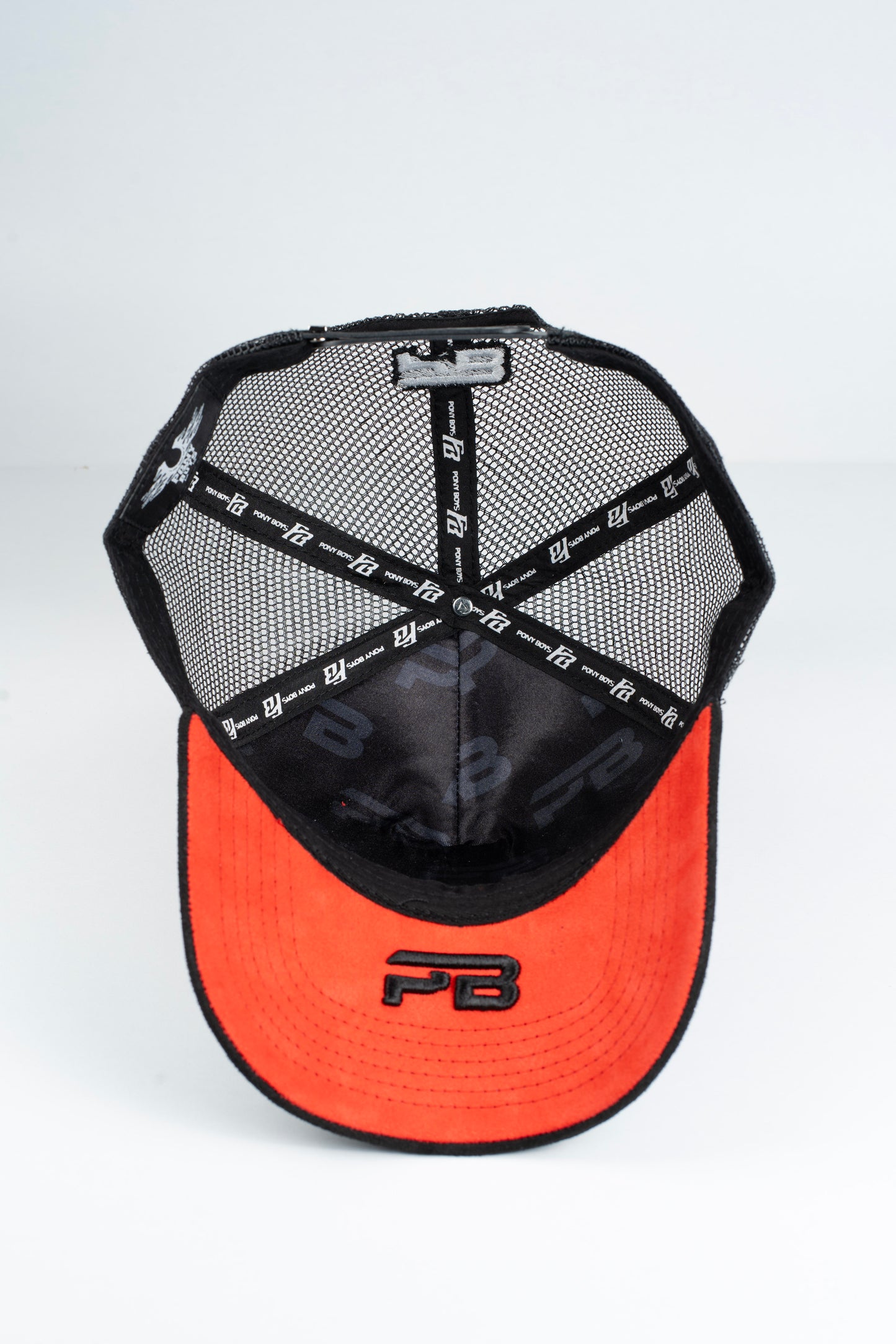 Arriba la Compañia trucker hat