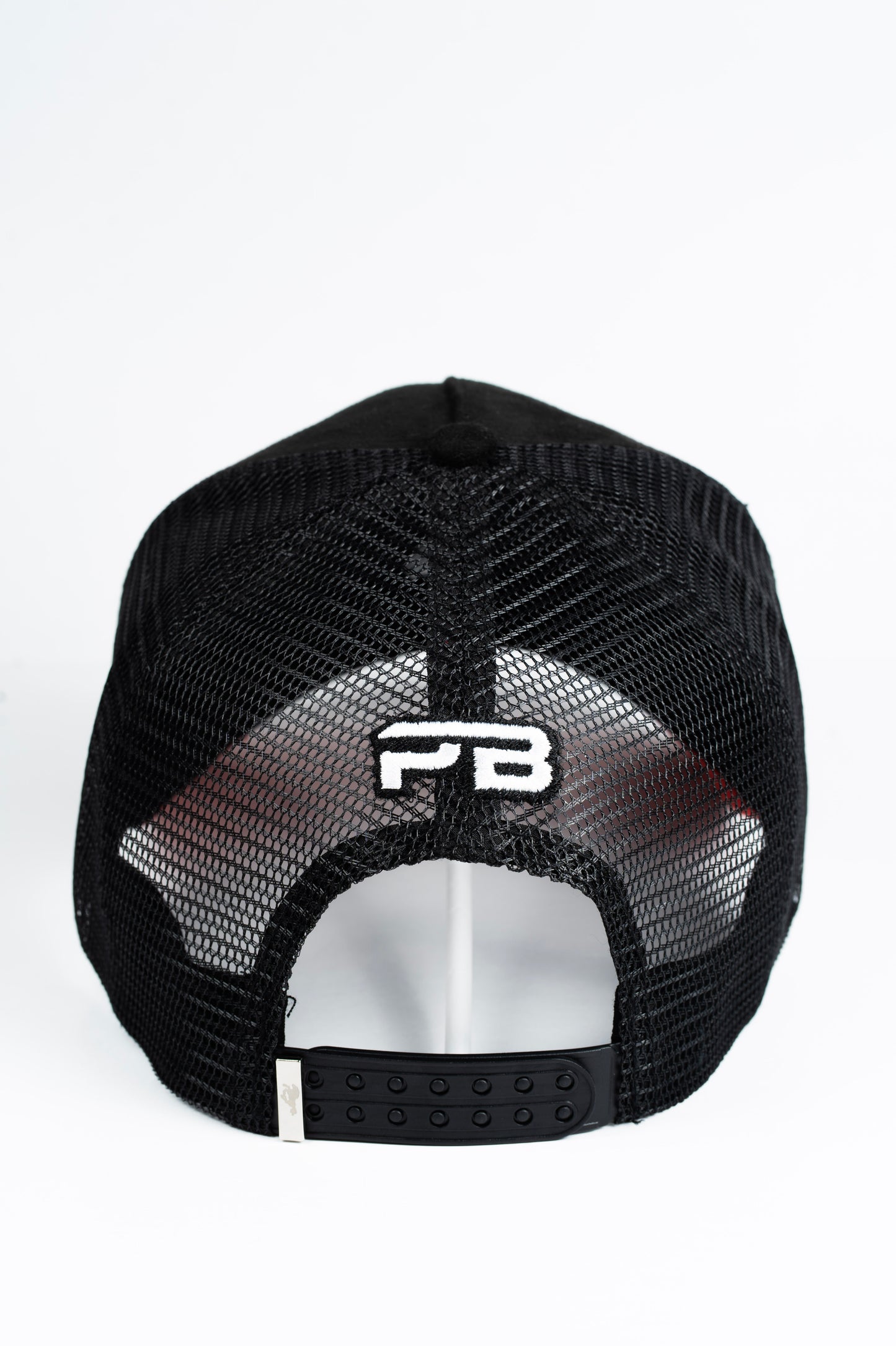 Arriba la Compañia trucker hat
